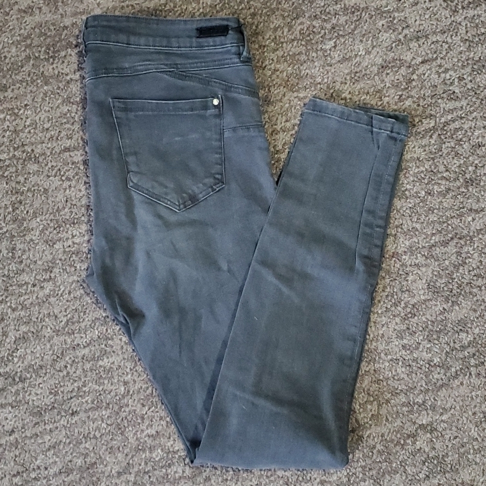 Eighty-two size 13 skinny jeans